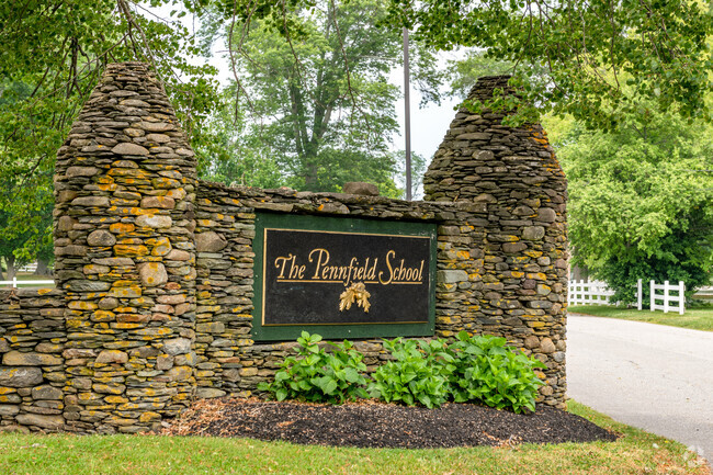 The Penfield School in Portsmouth sits on an old farm site and retains many rustic features.