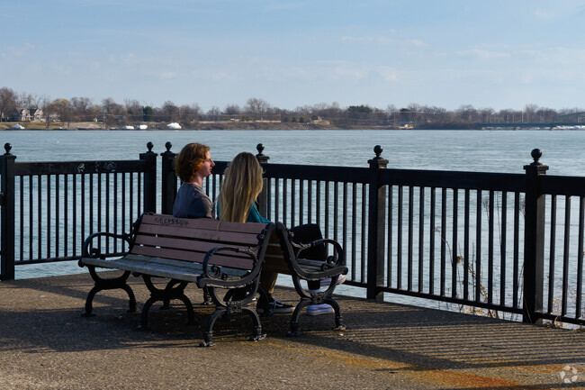 Enjoy a quiet moment with a loved one besides the Detroit River in Trenton.