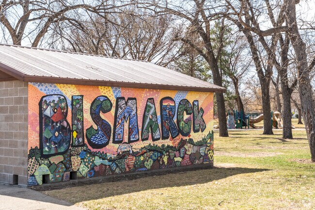 Downtown Bismarck locals enjoy beautiful public art murals installed at Kiwanis Park.