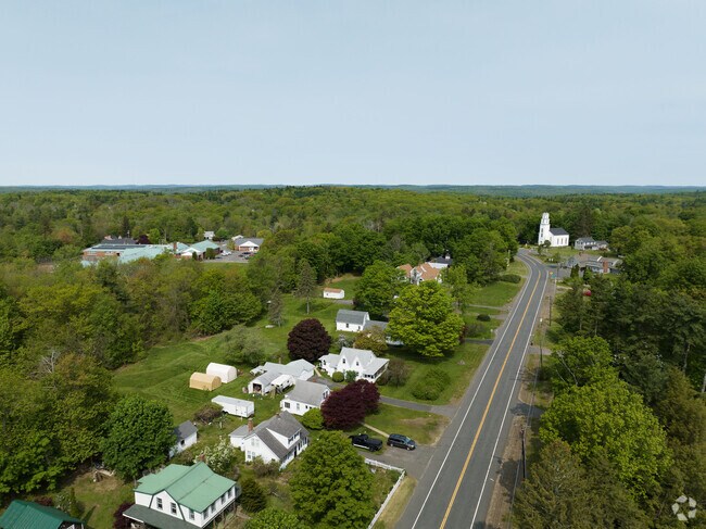 An aerial view coming into Hartland on route 20 with Hartland school in the distance.