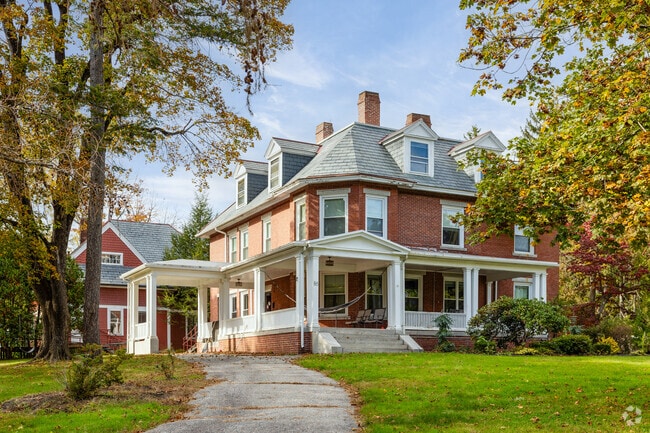 Large brick farmhouses are found on the streets of North End Nashua, NH.