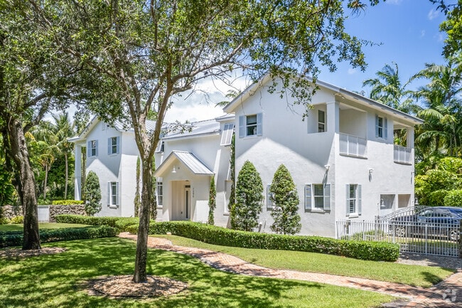 Homebuyers can find long driveways encompassed by pine trees on lots in Pinecrest.