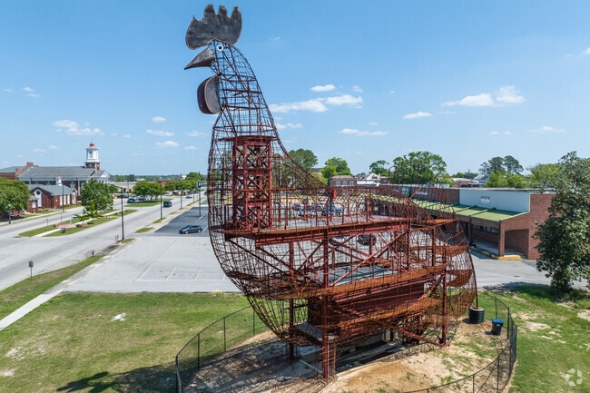 Fitzgerald's unofficial mascot is honored by a 62-foot tall statue of the Burmese chicken.