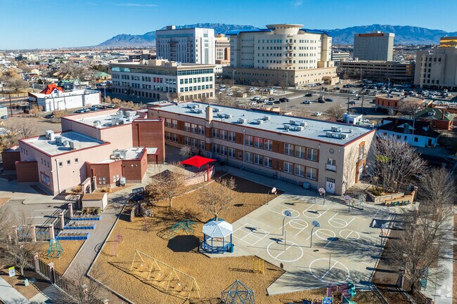 Lew Wallace Elementary School and the Sandia Mountains in the distance.