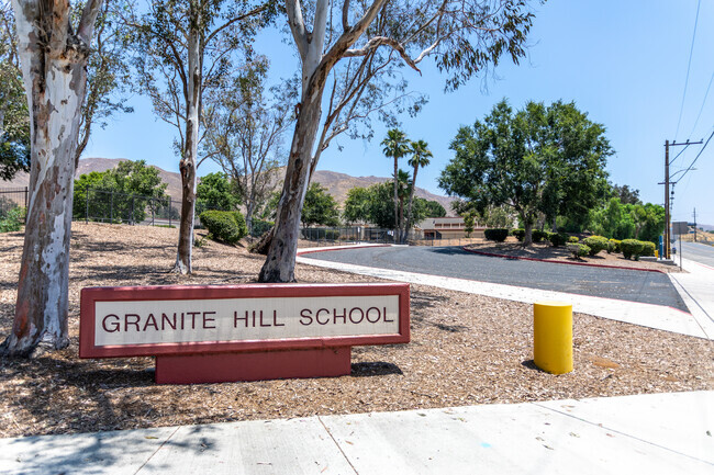 The signage at the entrance of Granite Hill Elementary School proudly displays its name.