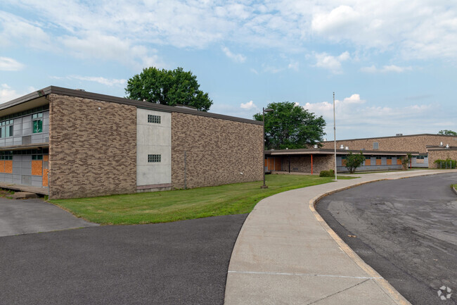 Closed since 2021, the George R. Staley Upper Elementary School has been securely boarded-up.