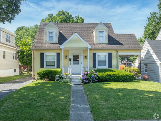 Cape-cods sit on neatly landscaped yards along the peaceful streets of Roselawn.
