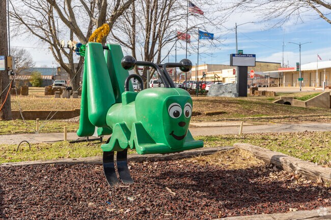 Ride the wild grasshopper at Charlie McCown Park.