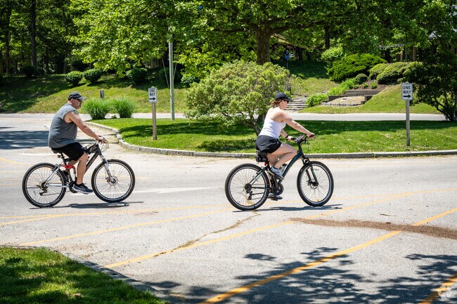 A couple is enjoying their bike ride at Goddard Memorial State Park in Nichols Corner, RI.
