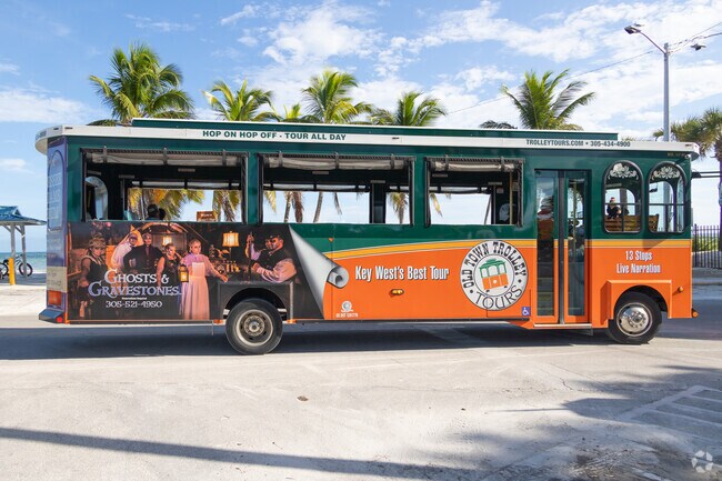 You can take a trolley tour around Key West to see the beautiful places.