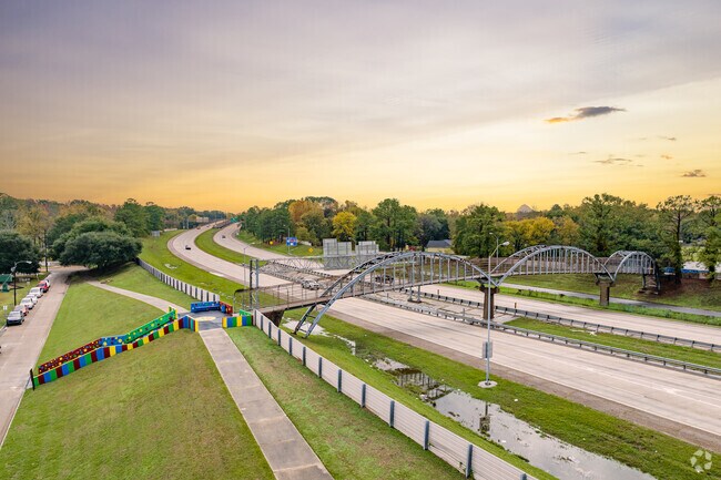 Interstate 110 runs through Scotlandville with pedestrian crossings.