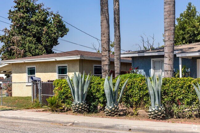 A bungalow with agave plants near Allen Street in Stadium Way.