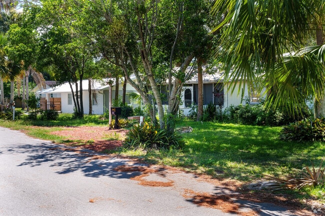 Mature trees commonly grace front yards, providing shade in the Central Mainland neighborhood.