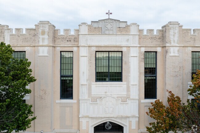 The stately architecture of Cassata Catholic High School adds character to its environment.