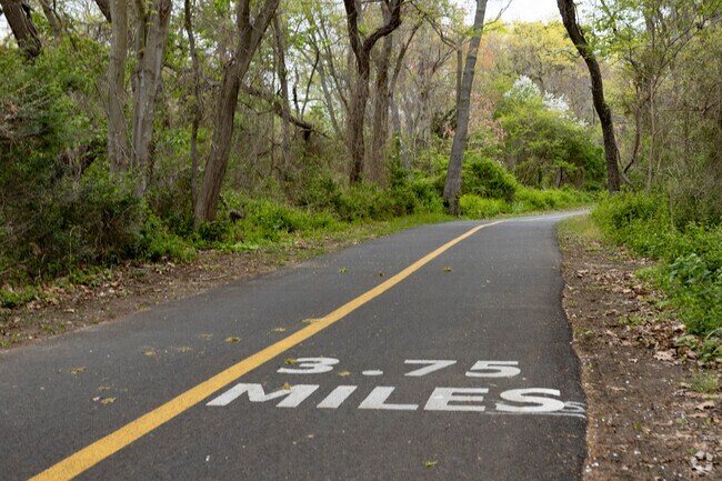Mile markers on the Bethpage Bikeway Trail let bikers know how far they have travelled.