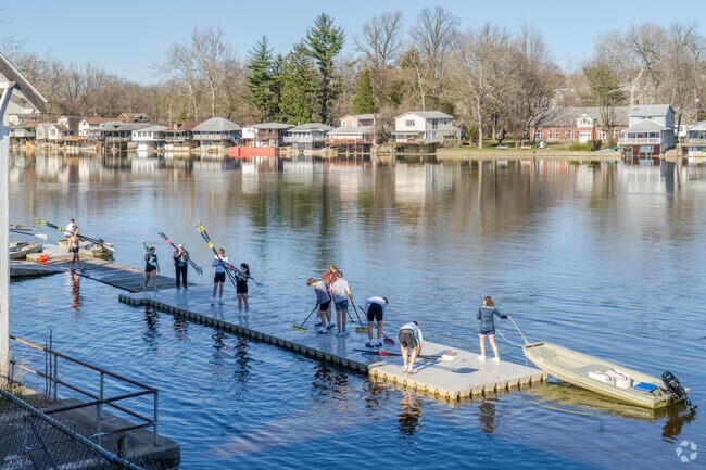 A crew team prepares for practice along the Lehigh River running through East Allentown.