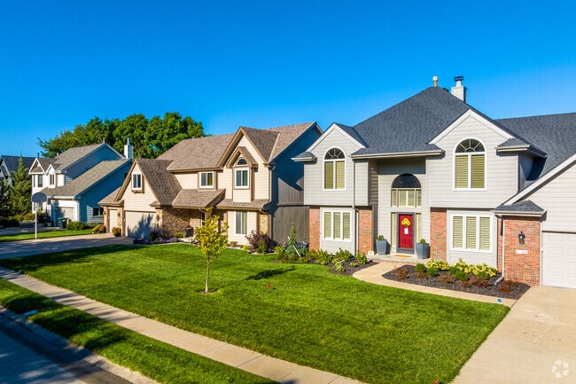 Large, two-story homes of varying styles are just steps from parks and trails.