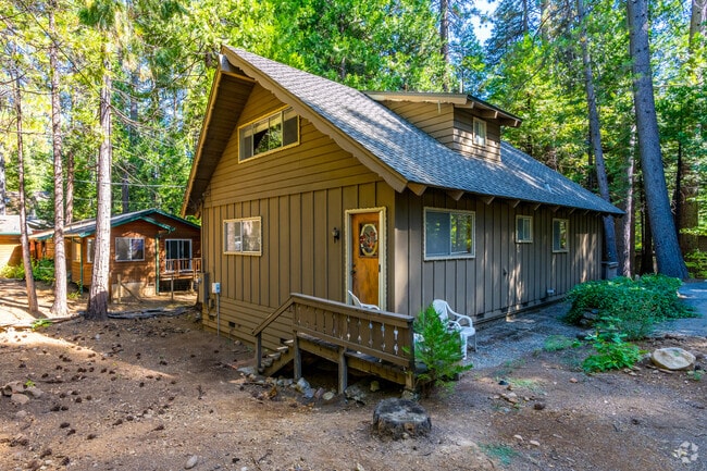 Arnold home showcases detailed roof trim and mountain charm.