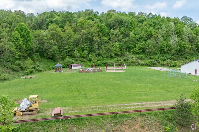 Students enjoy access to a playground and field at Champion Christian School North Campus.