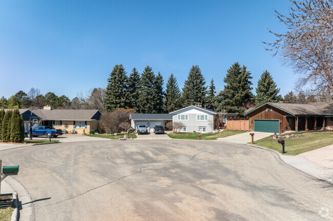 Ranch and split-level homes sit at the end of a cul-de-sac in Highland Acres.