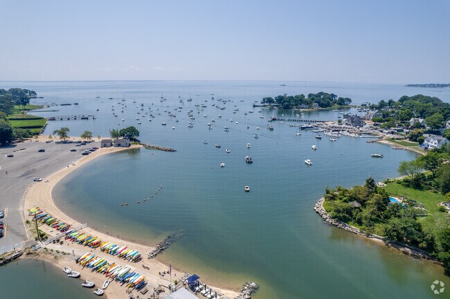 Pear Tree Point Beach in Darien is a popular attraction on a sunny day.