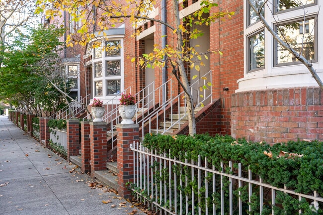 Dixwell’s brick townhomes line shady streets west of downtown.