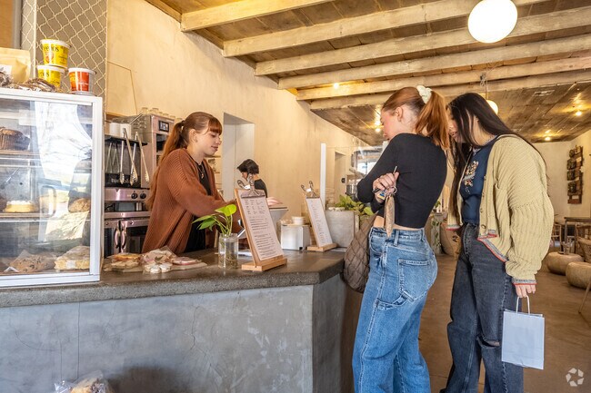 Serena Hills residents can grab a cup of freshly brewed coffee at The Press Espresso, just a short drive away, for a cozy and energizing start to their day.