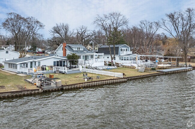 Lakefront homes in Shore Hills feature large decks, private docks, and scenic views.