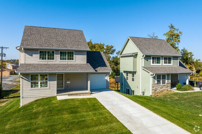 Newer two-story homes have been built on some Erskine Park streets to bring development in.