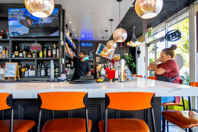 The Funny Farm has a great selection of spirits to pair with their poutine.