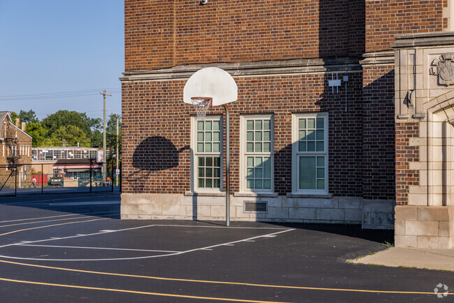 Basketball hoop and play area at Sharpsburg Elementary School in the Norwood neighborhood.