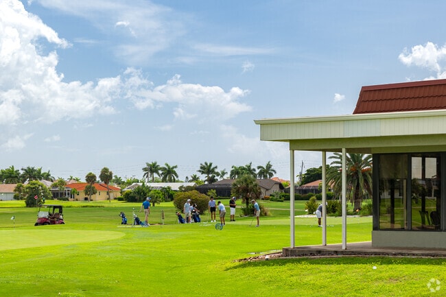Twin Isles Country Club offers putting greens, a driving range, and golfing lessons.