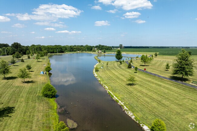 Take a walk or camp out next to the lake at Dolan City Park.