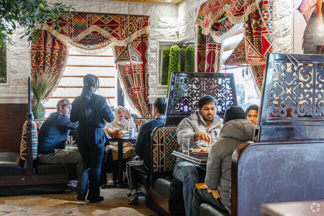 Enjoy quality food and a cozy atmosphere at Al Bawadi Grill in Washington Park.