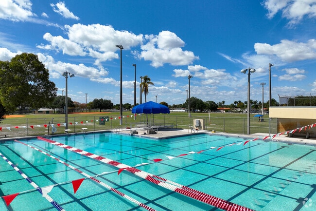 Visitors of the Norman and Jean Reach Park can take a dip in the pool to cool off.