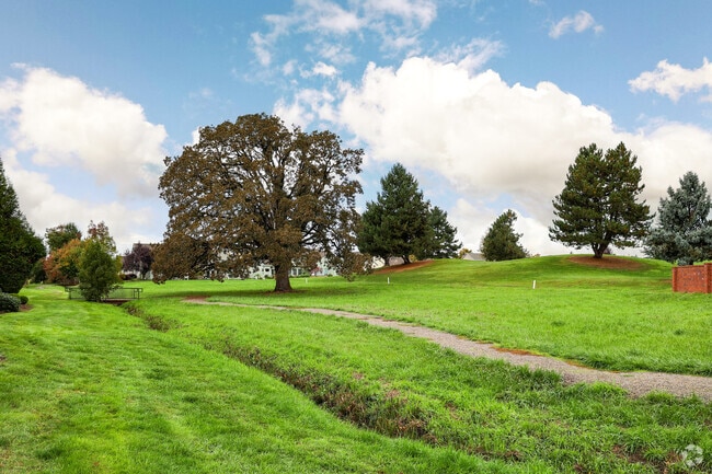 Woodburn homes offers a private 18-hole golf course as their backyard.