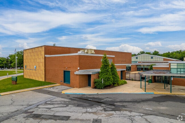 The main entrance of Mount Pleasant High School welcoming students.