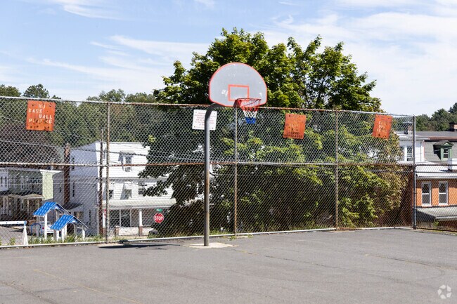 The playground on Clay Street is a great spot to shoot hoops and enjoy a pickup basketball game in New Philadelphia.