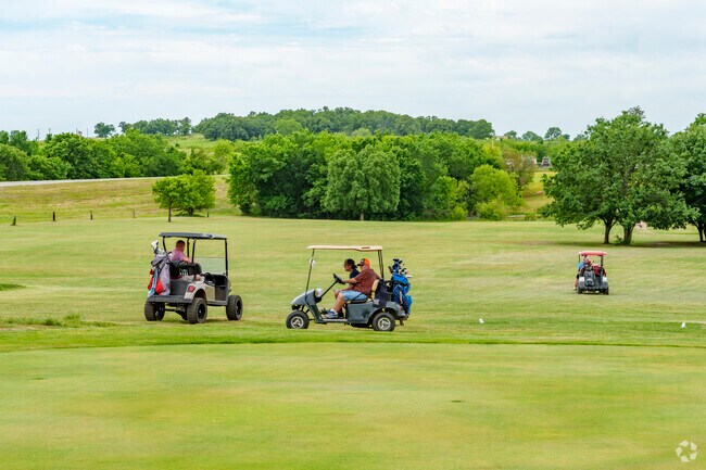 Golfers love play a game after work at the Central Pawnee golf course.
