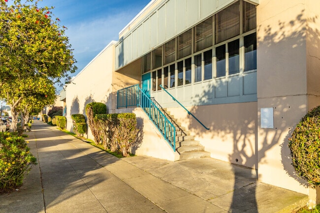 Woodrow Wilson Elementary sits on a long tree-lined street.