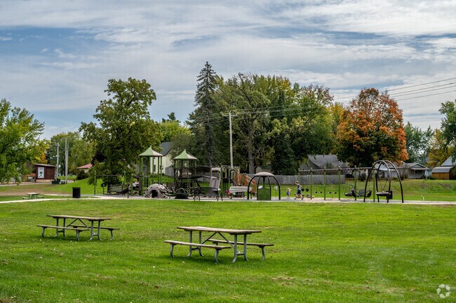 Families enjoy the large playground at Anderson Park.