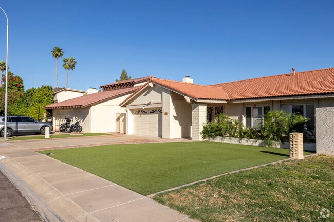 Some residents in The Lakes are moving to a water friendly faux lawn.