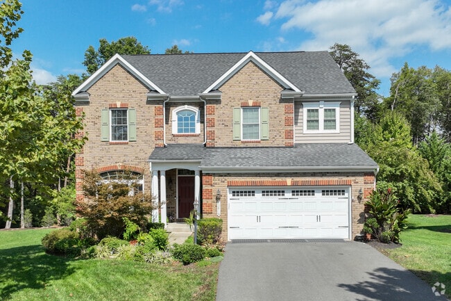 Large single-family homes with lush front yards adorn Wellington.