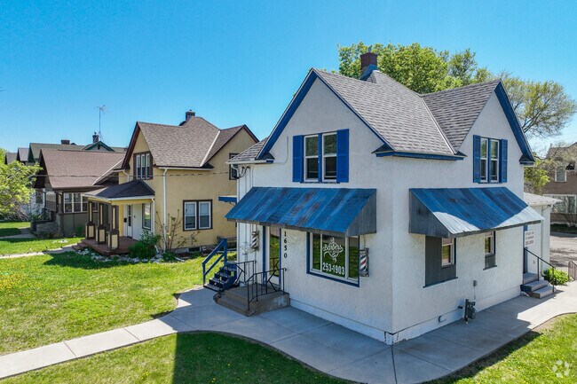 Some homes in the Saint John Cantius neighborhood have in-home businesses along West St. Germain Street.