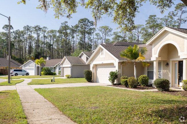 Ranch style homes in Williamsburg are lined with sidewalk.