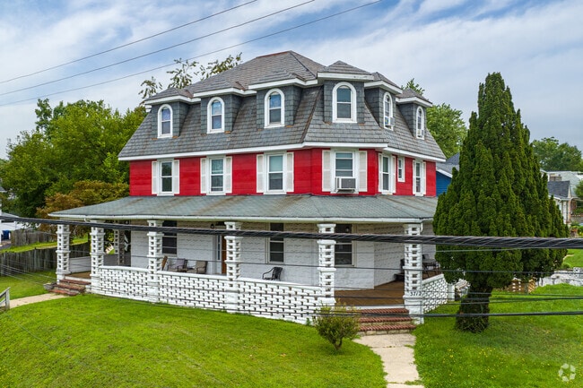 An old Victorian style home in Belair-Parkside with a full wrap around porch.