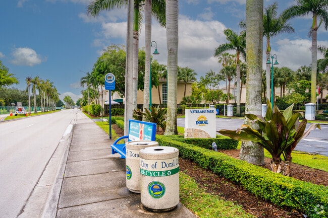 Benches at bus stops provide convenience in Vanderbilt Park.