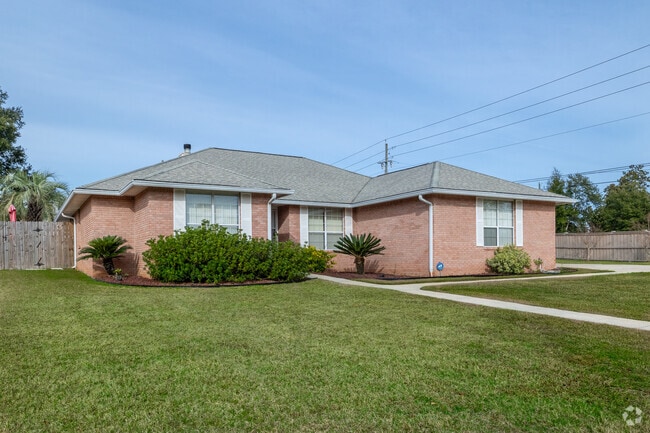 Brick ranch-style homes are common across Gonzalez.