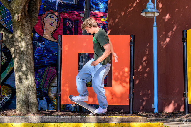 A man enjoys a pocket park in Old Town, which is just a short skateboard ride from Turner-Dodge.