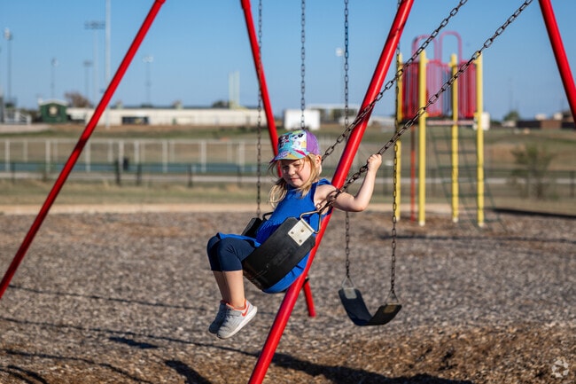 Kids love to swing at East Side Park near Sungate.